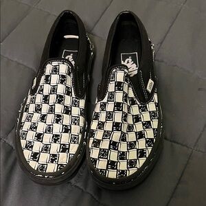 Vans Black and White Patterned Slip-On Sneakers